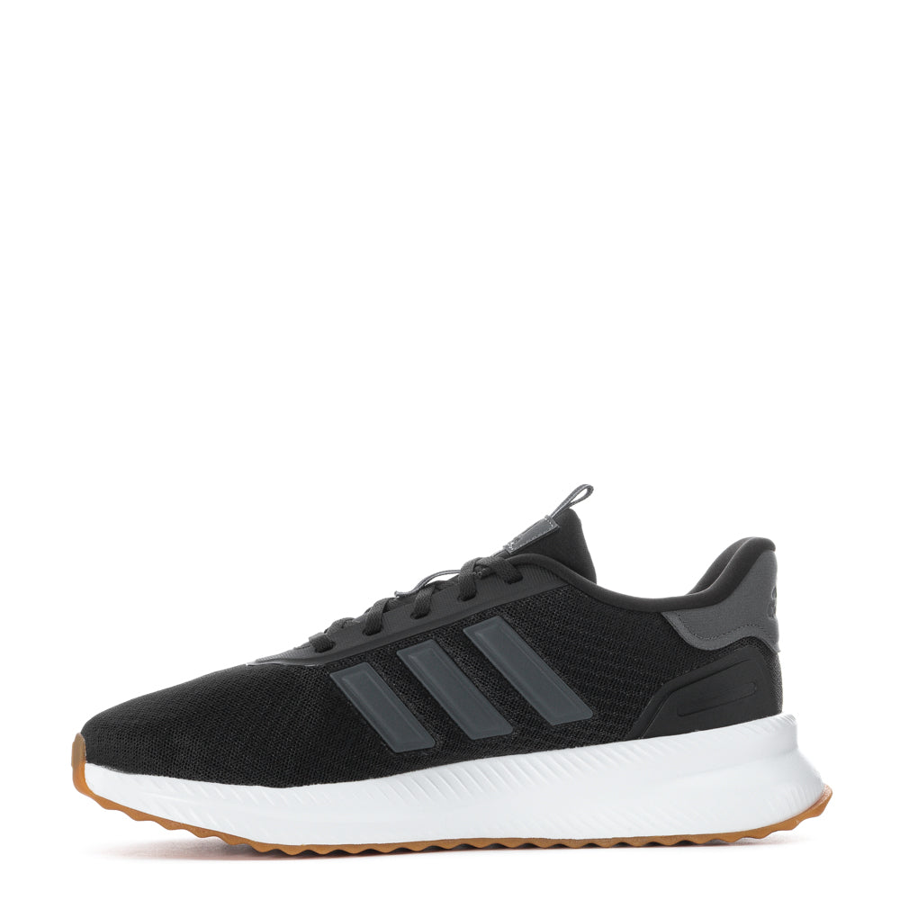 Stride Comfort Wide Fit Sneakers worn by a man during a casual outing.