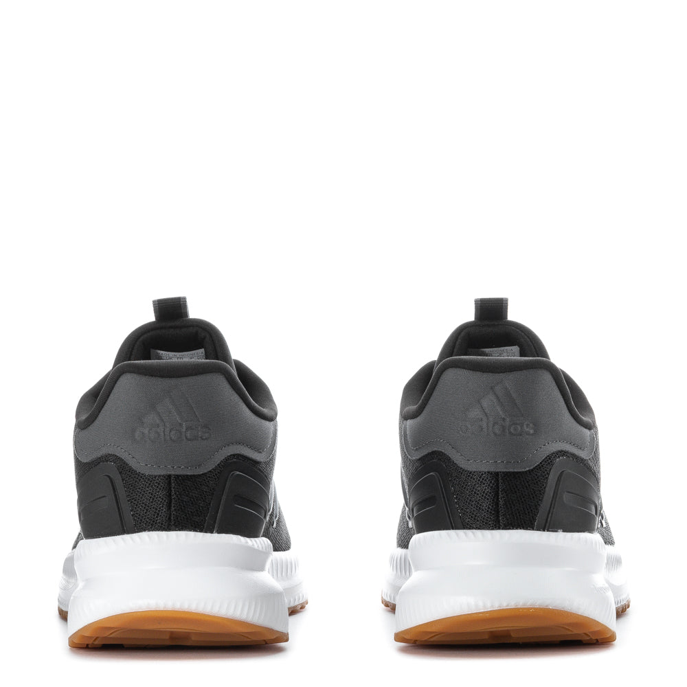 Stride Comfort Wide Fit Sneakers worn by a man during a casual outing.