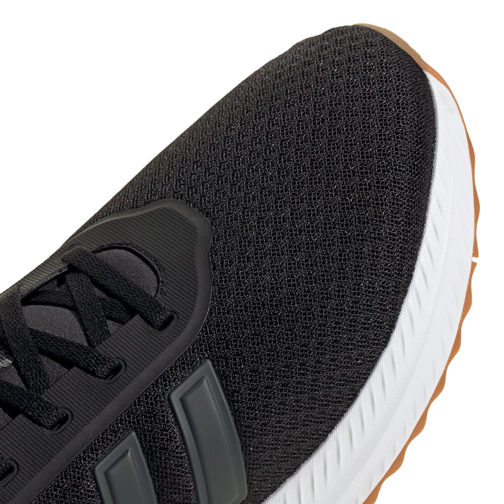 Side view of Stride Comfort Wide Fit Sneakers highlighting their wide width fit.