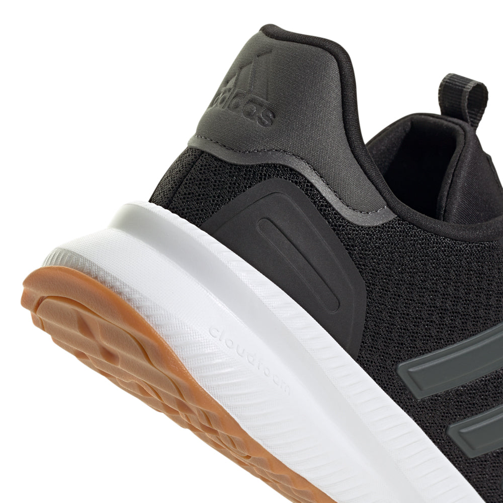 Close-up of Stride Comfort Wide Fit Sneakers showcasing the design and material.