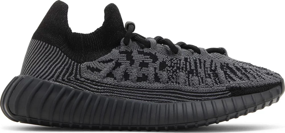 Side view of Adidas Yeezy 350 V2 CMPCT Slate Onyx sneakers showcasing the sleek design.