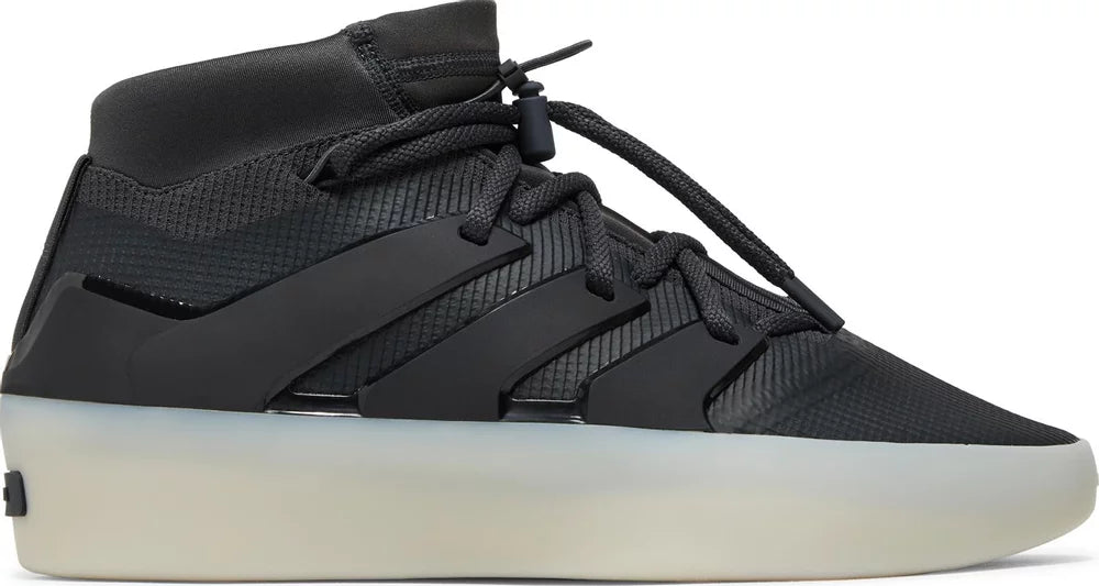 Side view of Adidas Fear of God Carbon basketball shoes highlighting sleek design and carbon accents
