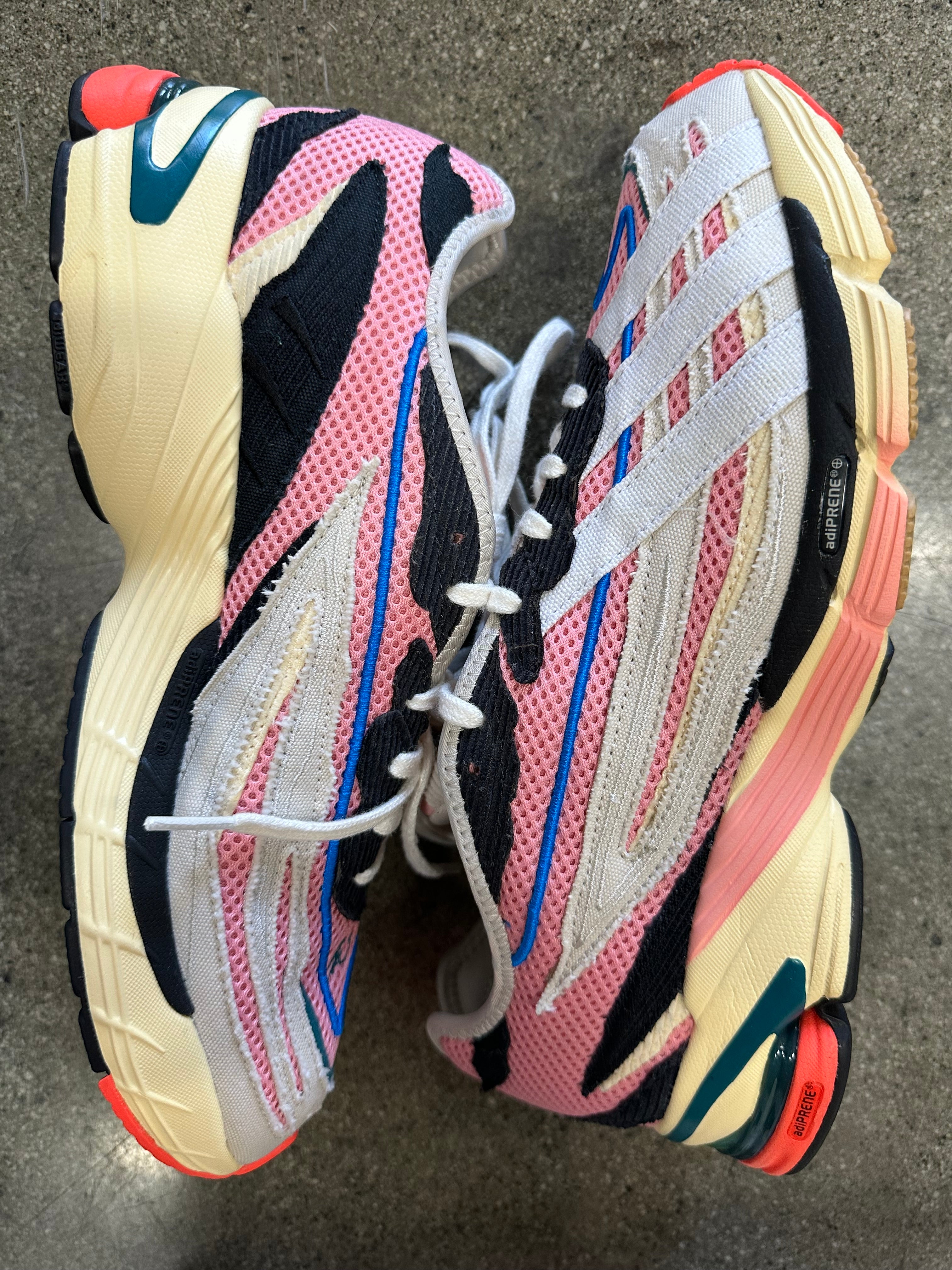 Top view of preloved Adidas Orketro size 10 sneakers, highlighting their quality.