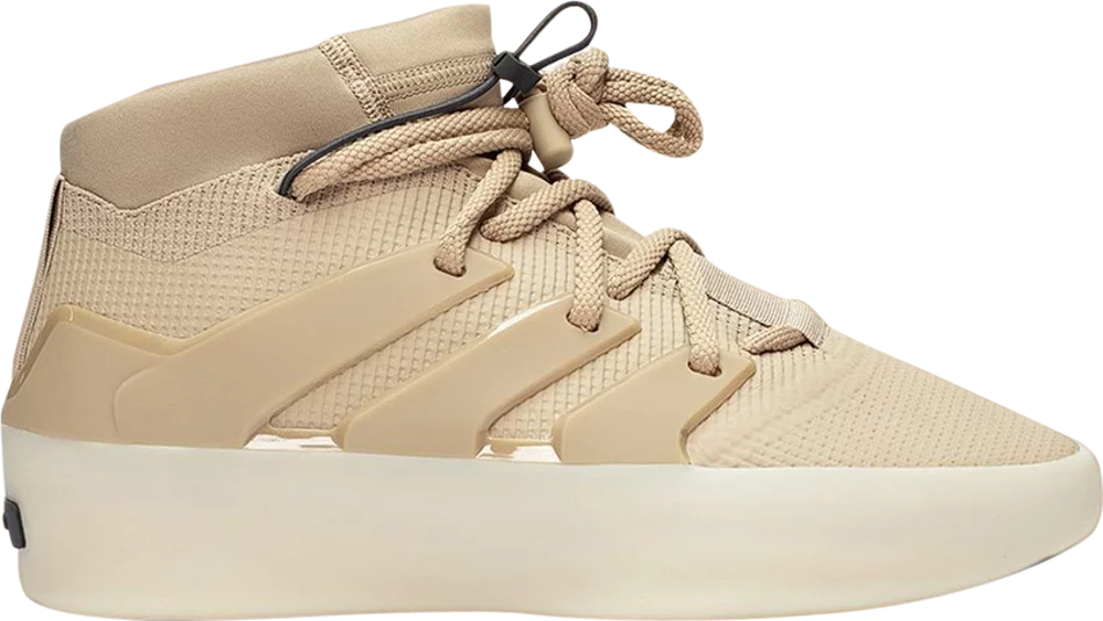 Adidas Fear of God basketball sneakers in clay color on court surface