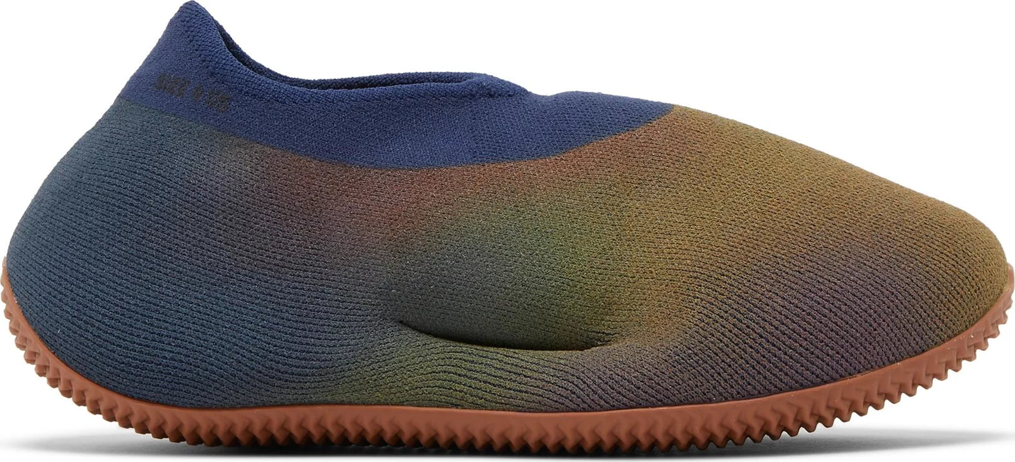 Adidas Yeezy Knit RNR Fade Indigo sneakers from the side, showcasing the unique colorway.