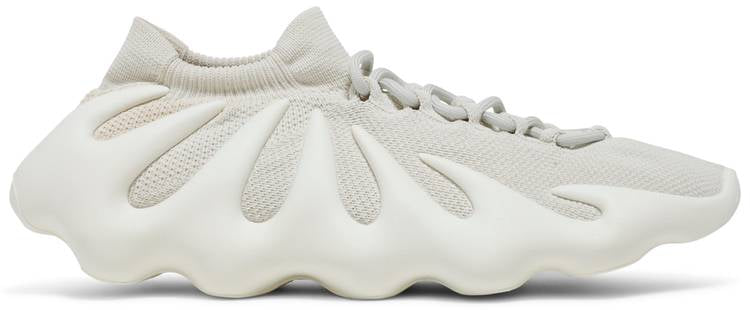 Close-up view of Adidas Yeezy 450 Cloud White sneakers showing unique design and texture.