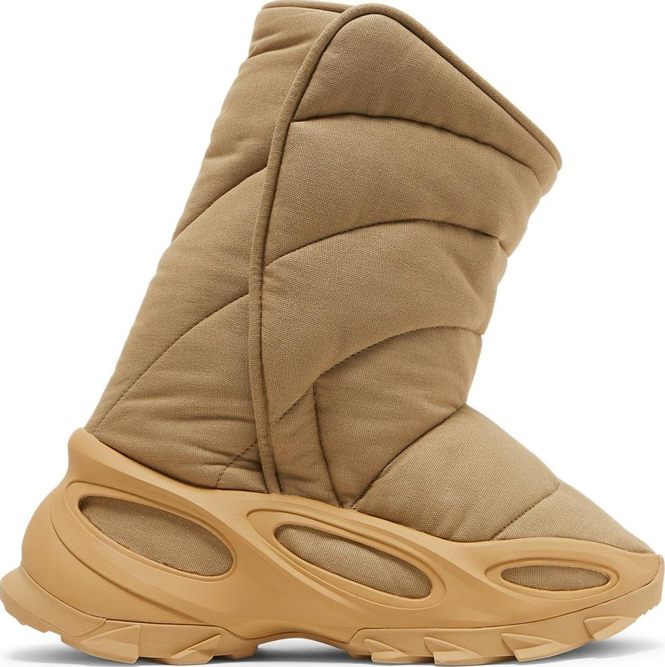 Side view of Adidas Yeezy NSLTD Boot in Khaki, showcasing its stylish design.