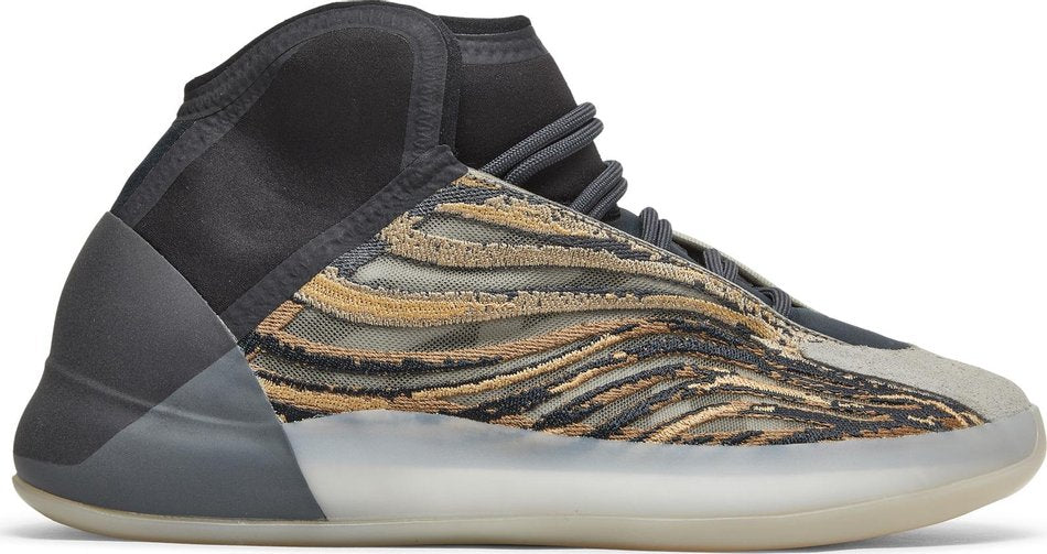 Adidas Yeezy QNTM Amber TINT sneakers viewed from the side, showcasing its sleek design and vibrant color.