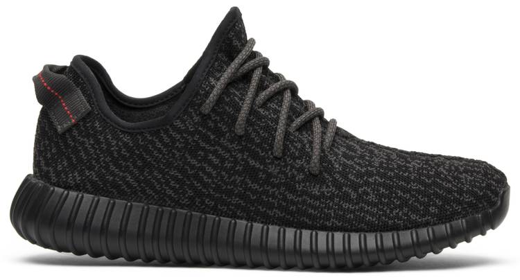 Side view of Adidas Yeezy Boost 350 Pirate Black sneakers highlighting the unique silhouette.