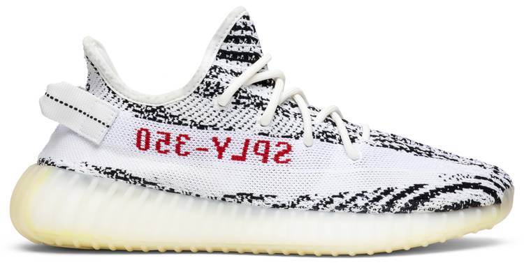 Side view of Adidas Yeezy Boost 350 V2 Zebra sneakers showcasing the striped design