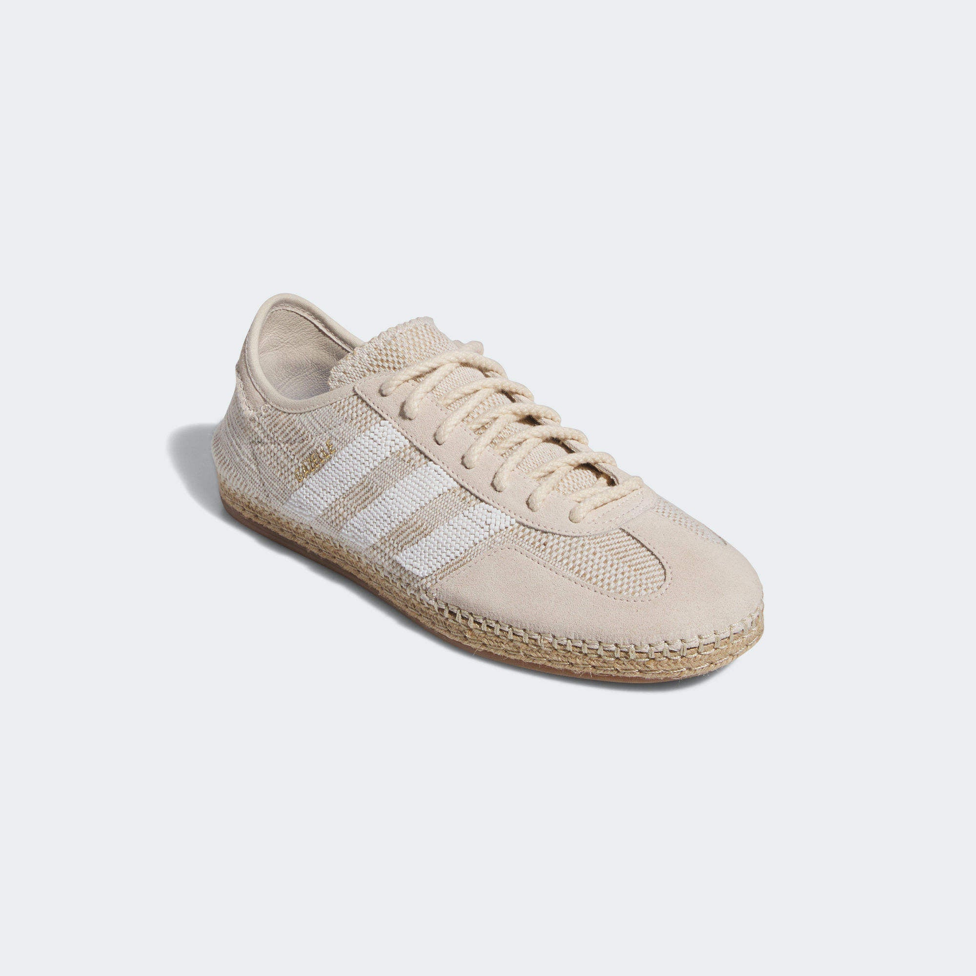Side view of Adidas CLOT Gazelle Halo Ivory sneakers highlighting the embroidered glass beaded stripes