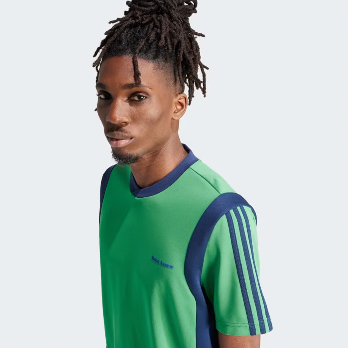 Back detail of the shirt featuring the embroidered Trefoil logo