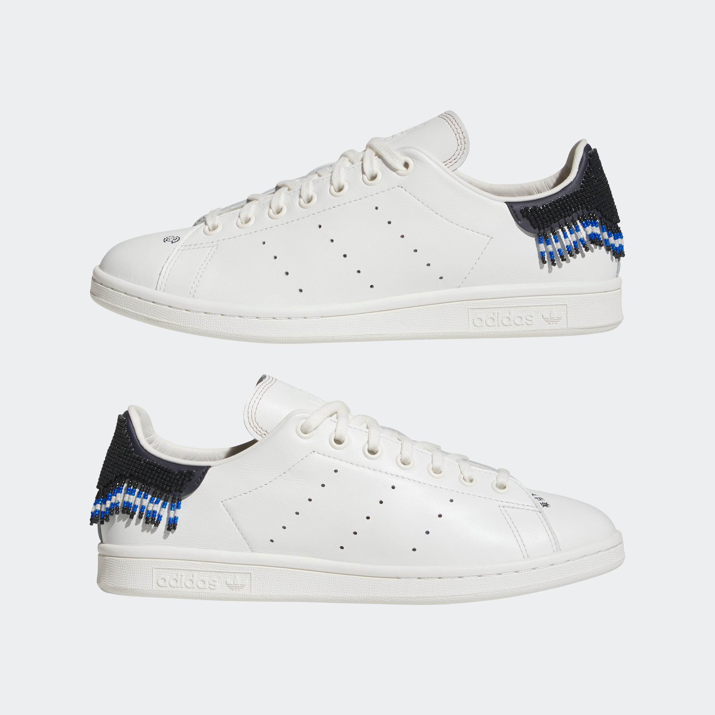 Side view of CLOT x adidas Stan Smith Beaded sneakers with beaded heel tab
