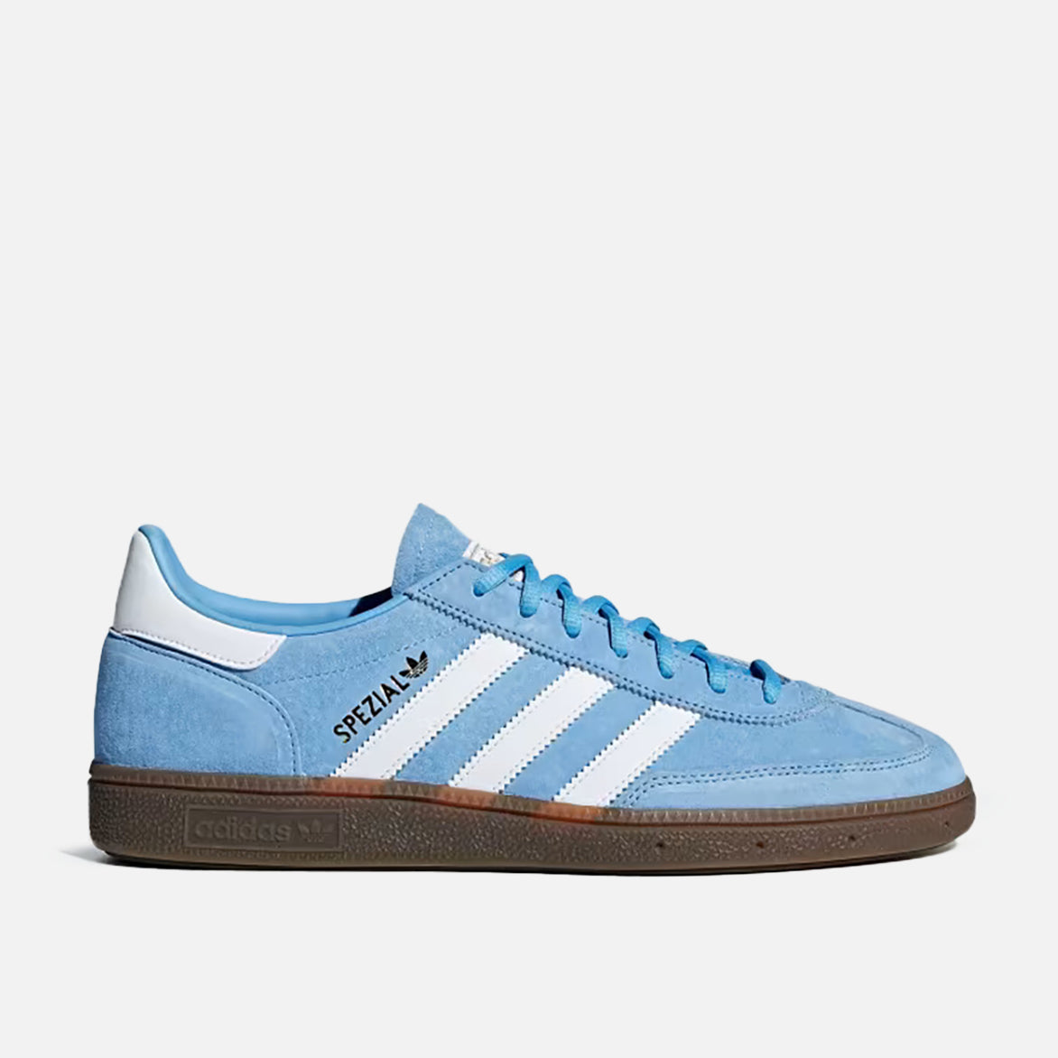 Side view of Handball Spezial light blue sneaker on a wooden floor.
