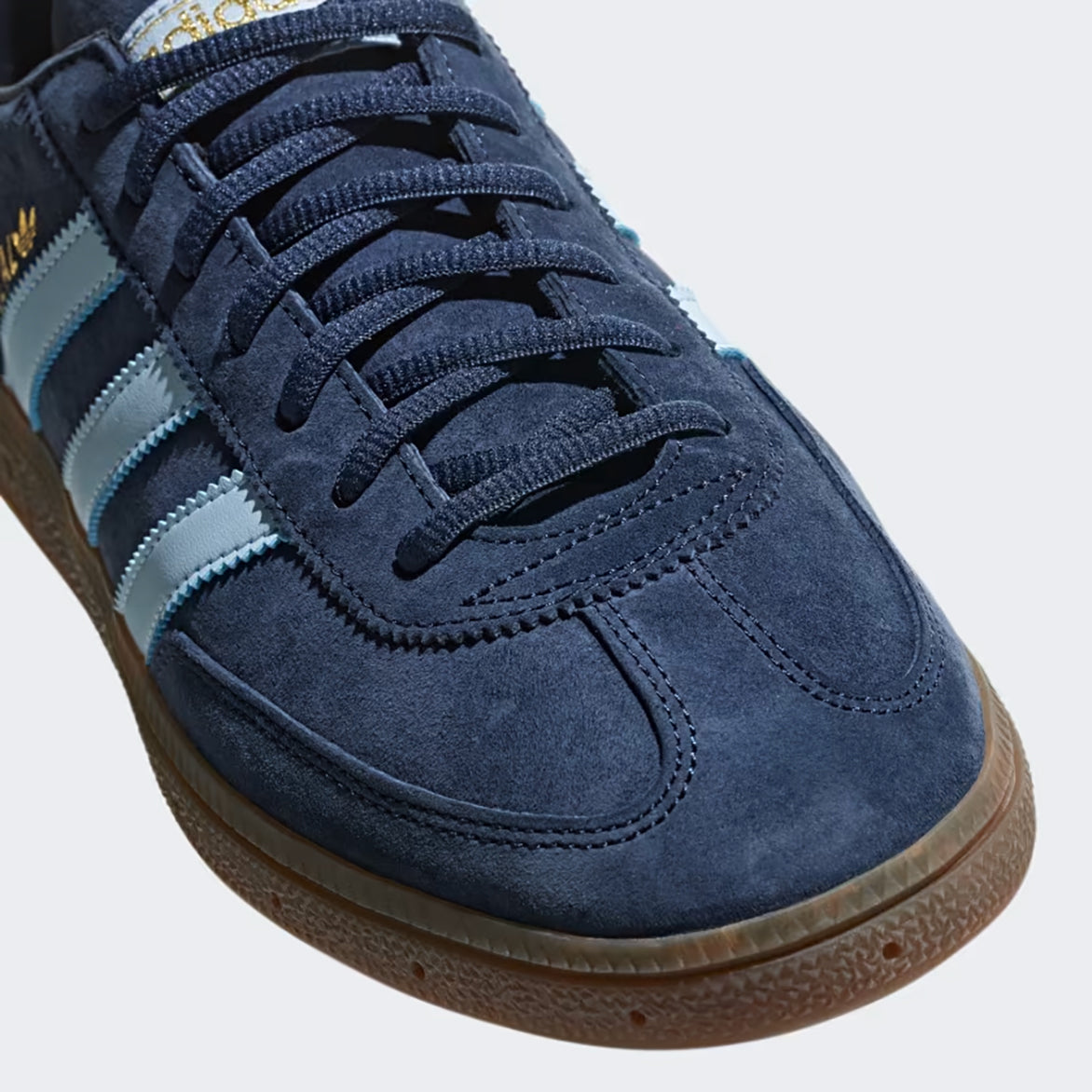 Side profile of handball Spezial sneakers highlighting the leather accents and sole