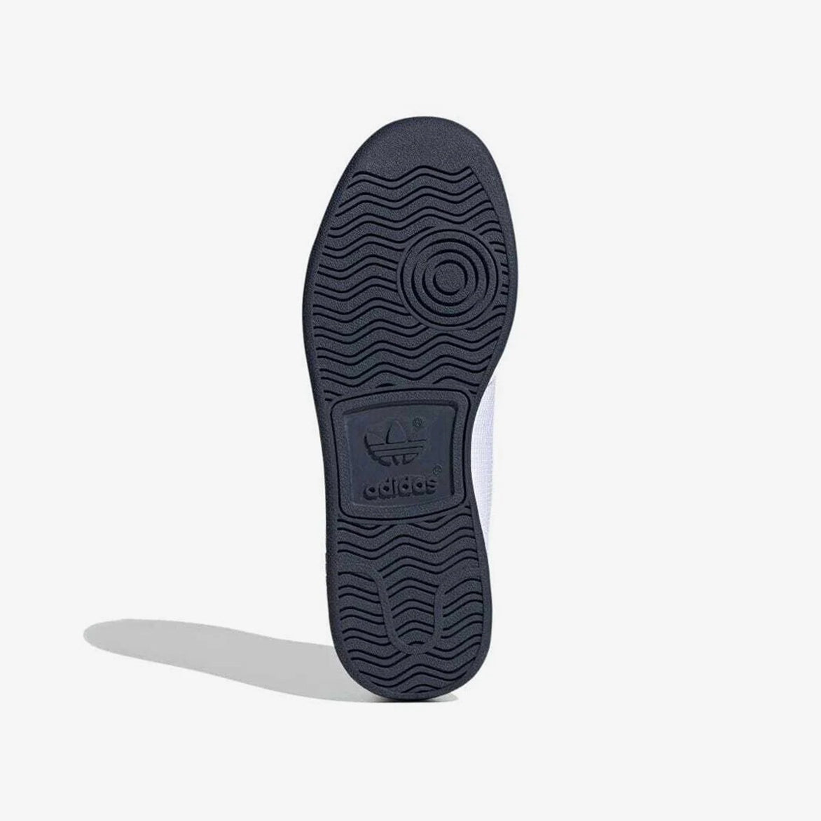 Adidas Rod Laver sneakers worn casually, demonstrating their stylish appeal for everyday use.