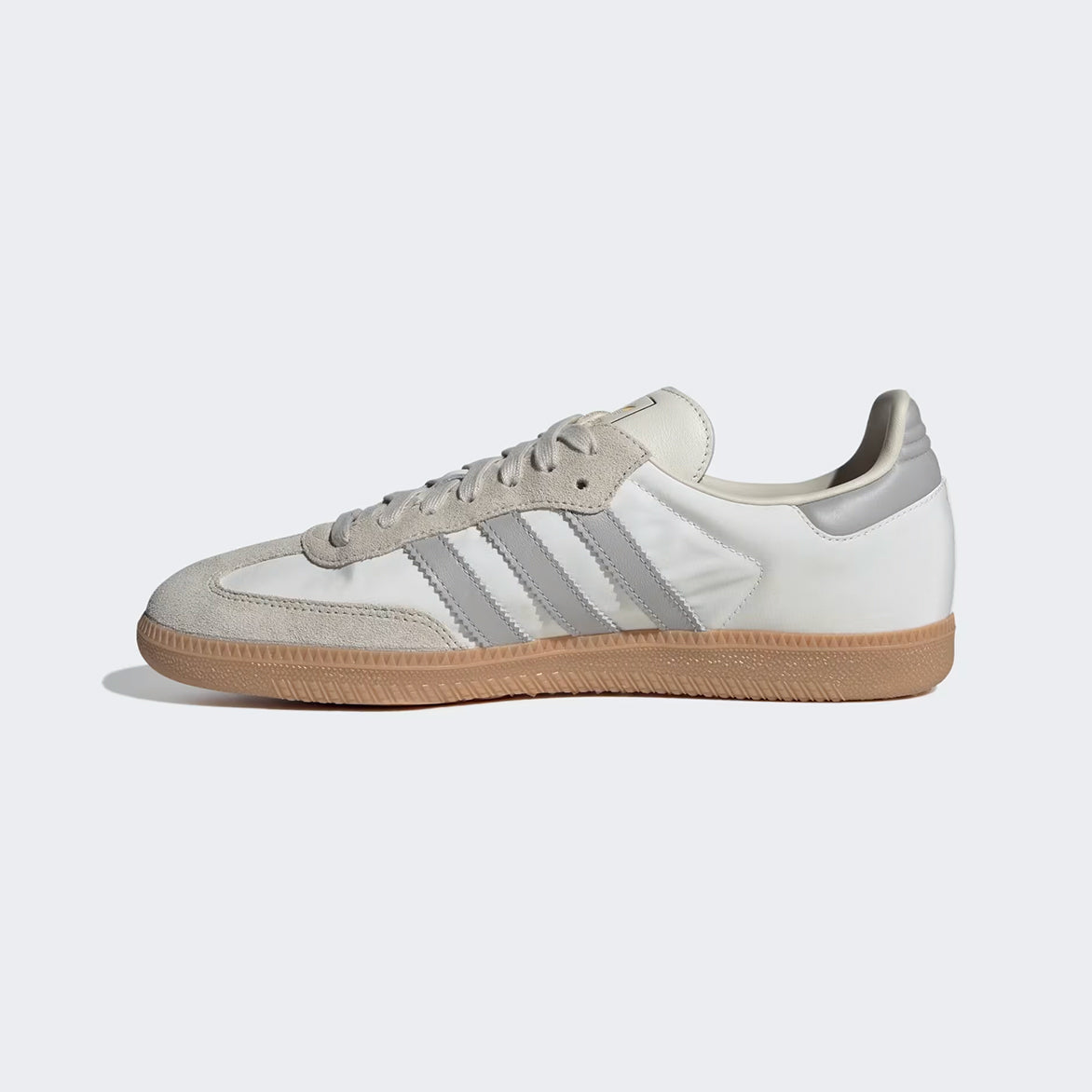 Adidas Samba OG sneakers in off white and grey showing side profile for street style