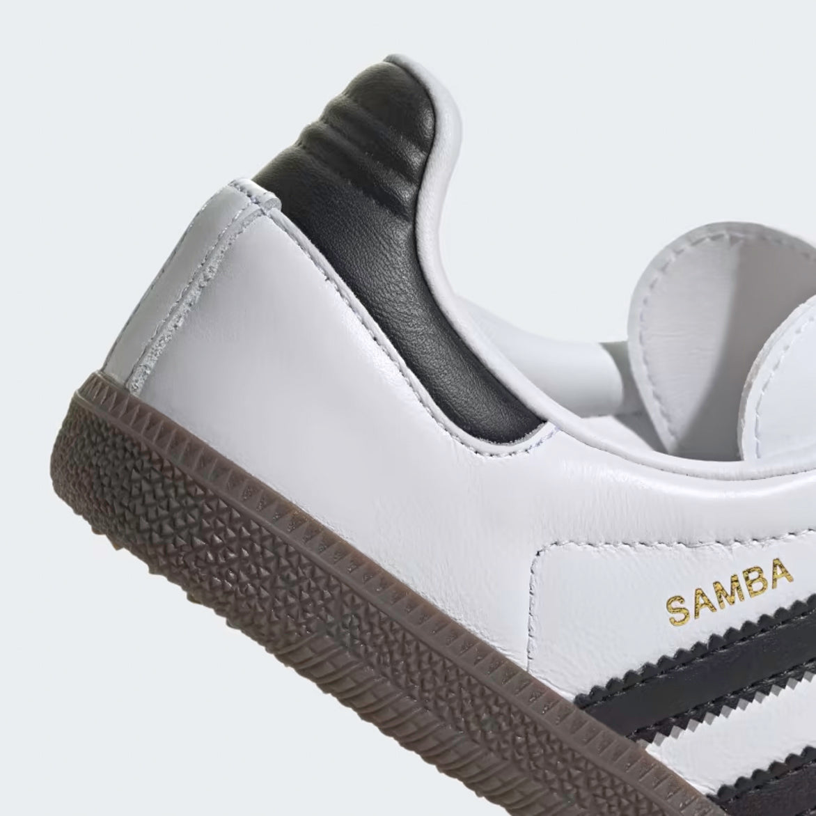 Top-down angle of Samba OG kids shoes highlighting Bluebird tongue tag and laces