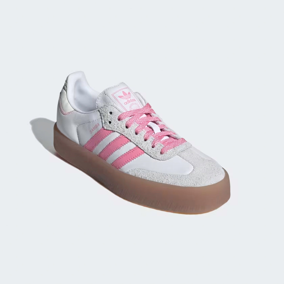 Close-up of the pink laces and logo on Adidas Sambae sneakers