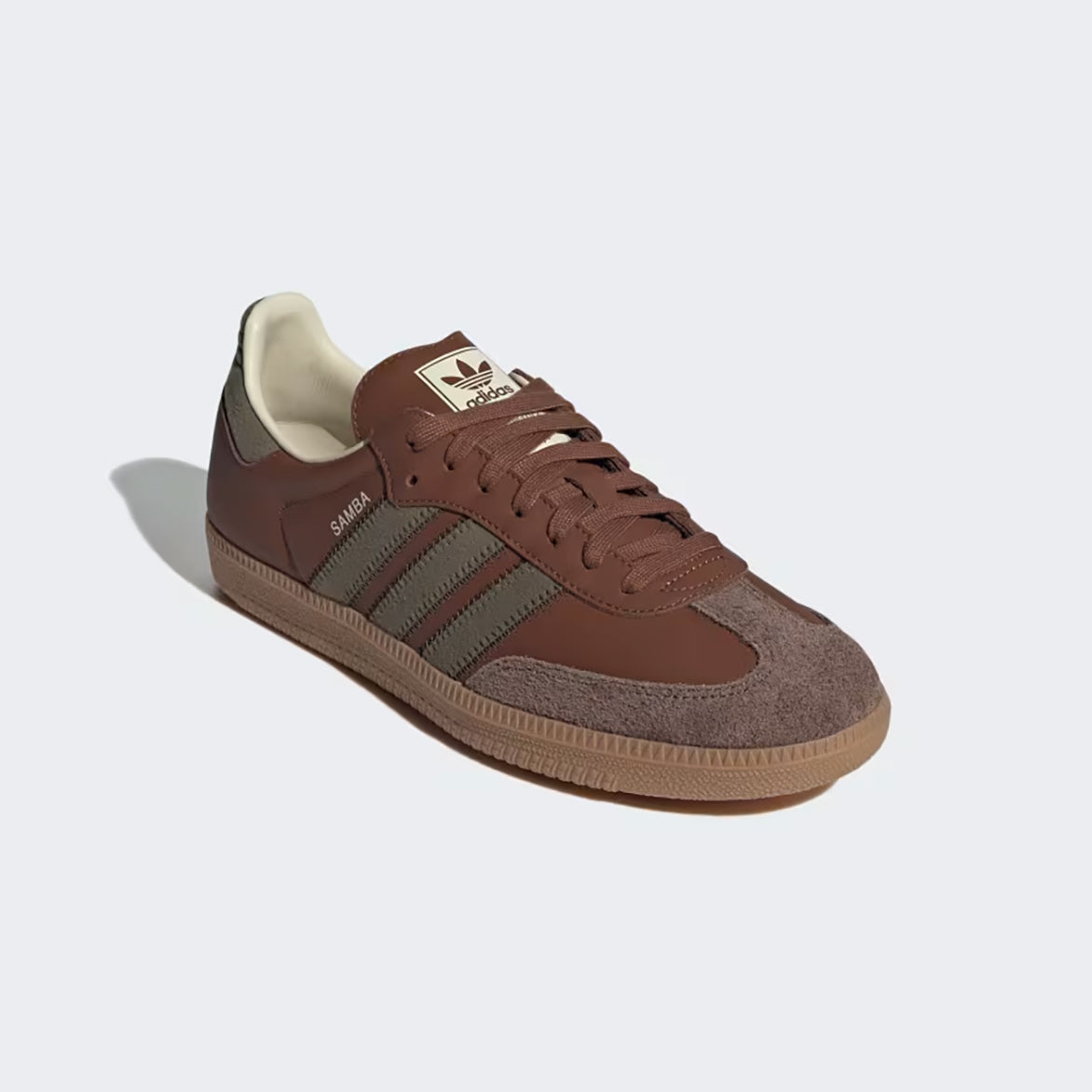 Close-up of the gum rubber outsole of Adidas Samba OG sneakers, perfect for stylish comfort.