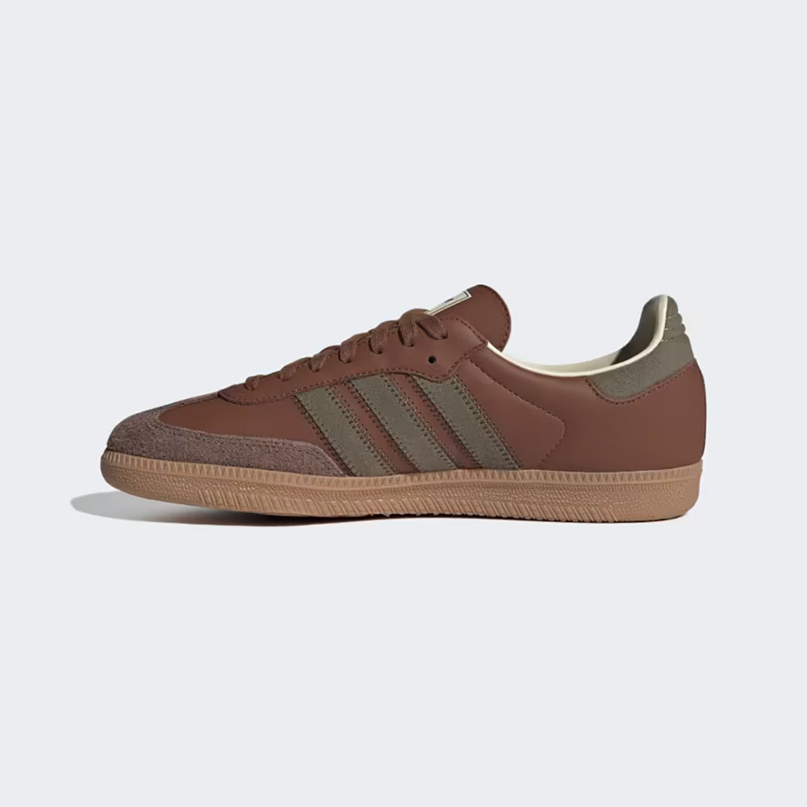 Top view of Adidas Samba OG shoes highlighting the suede toebox and tonal brown laces.