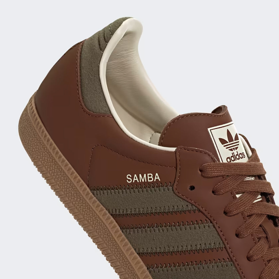 Close-up of the gum rubber outsole of Adidas Samba OG sneakers, perfect for stylish comfort.