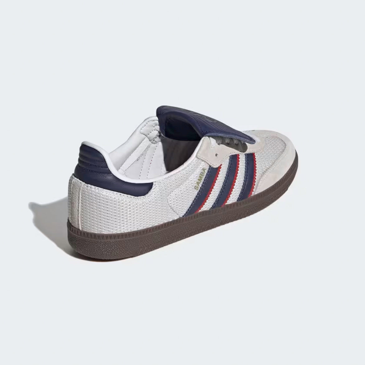Close-up toe box detail highlighting crystal white mesh and gum rubber outsole texture