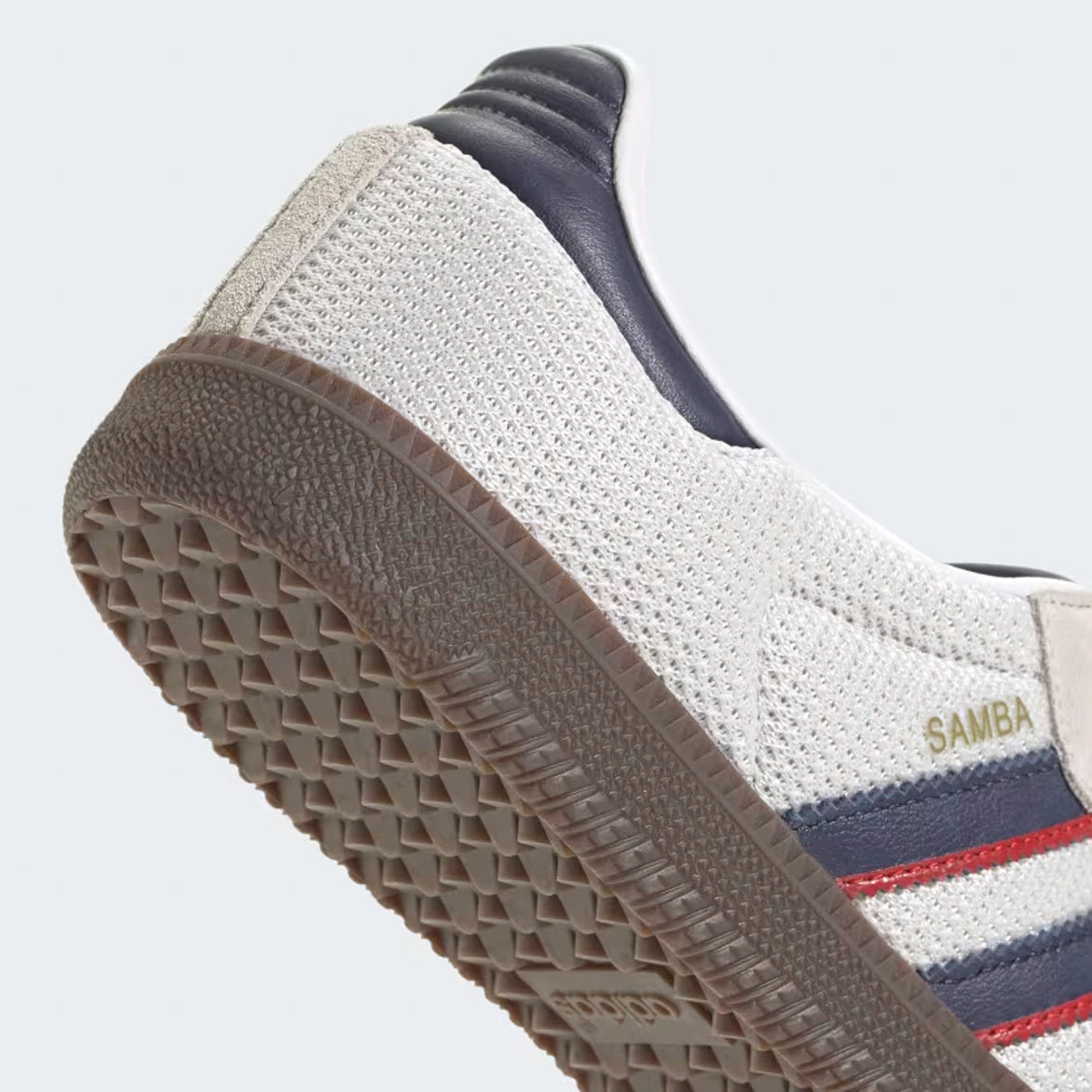 Close-up toe box detail highlighting crystal white mesh and gum rubber outsole texture