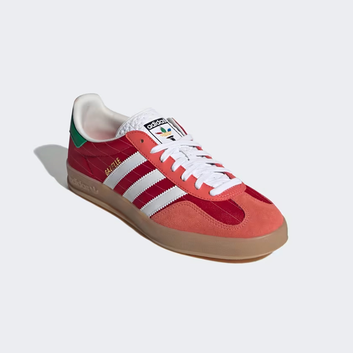 Adidas Gazelle sneakers worn casually outdoors, emphasizing their stylish design and comfort.
