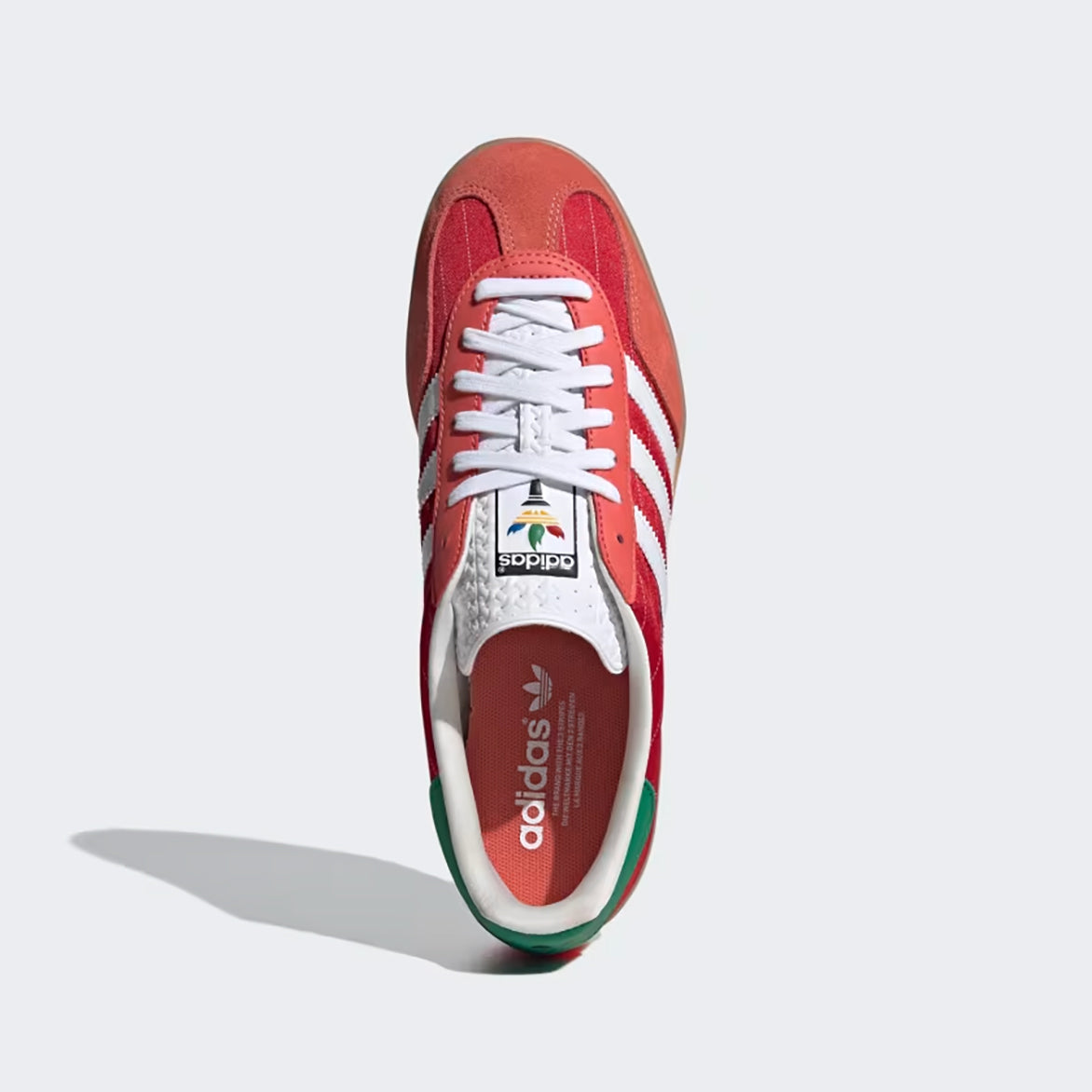 Close-up of the Adidas Gazelle Indoor sneakers highlighting the gum rubber sole and textured tongue.