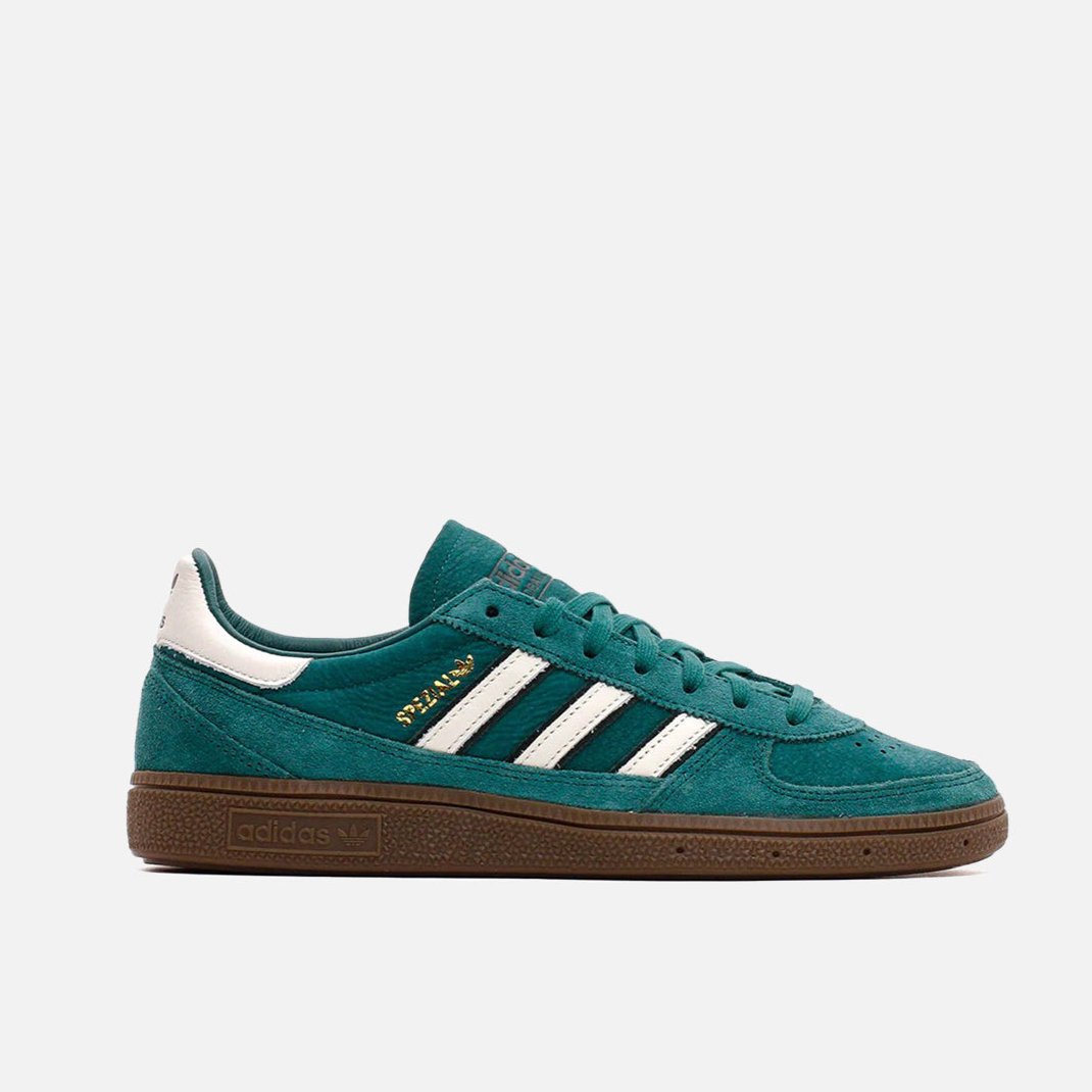 Top-down shot of adidas Handball Spezial Noble Green mens size 9 on concrete, white 3-Stripes gleaming