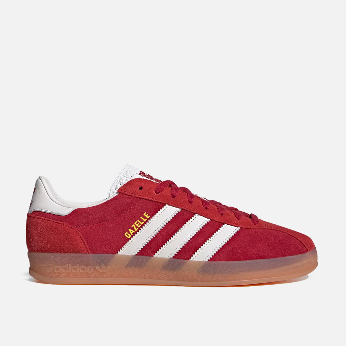 Close-up of Victory Red Gazelle Indoor Pro sneakers showcasing the suede texture and white leather details.