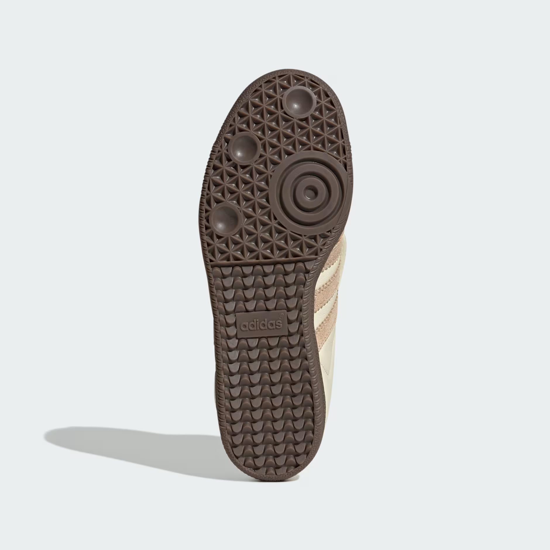 Top view of the Adidas Samba Long Tongue, highlighting the unique folded rubber tongue and gold foil branding.