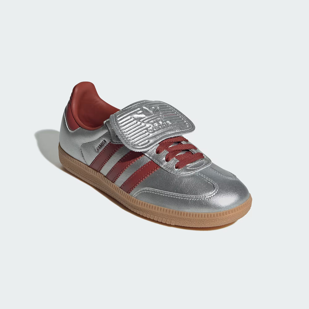 Samba Long Tongue sneakers worn casually with streetwear attire, highlighting their versatility.