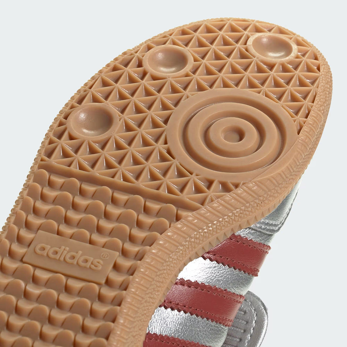 Samba Long Tongue sneakers worn casually with streetwear attire, highlighting their versatility.