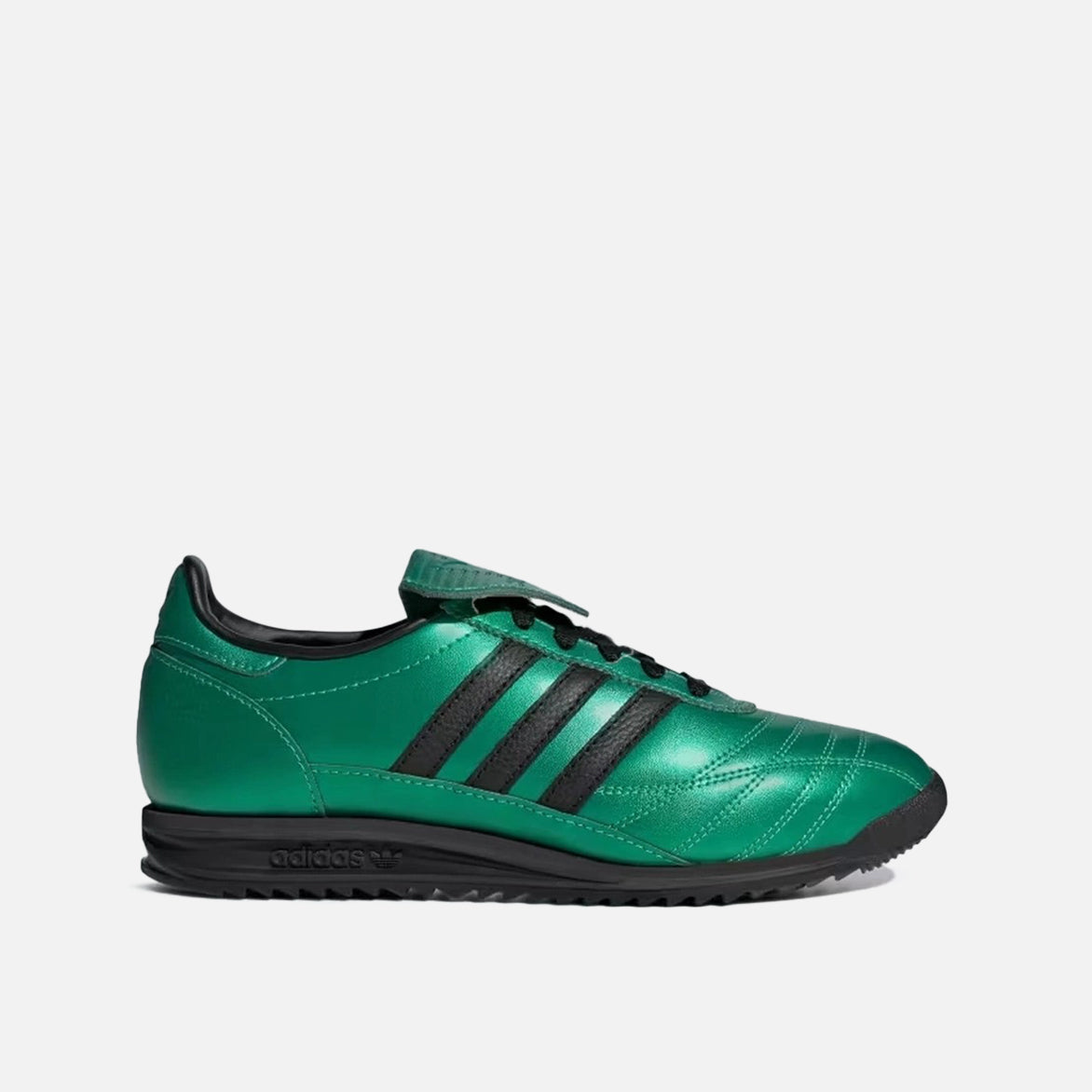Close-up view of Adidas SL 72 OG Women's Retro Sneakers in Semi Screaming Green, highlighting the textured foldover tongue and leather upper.