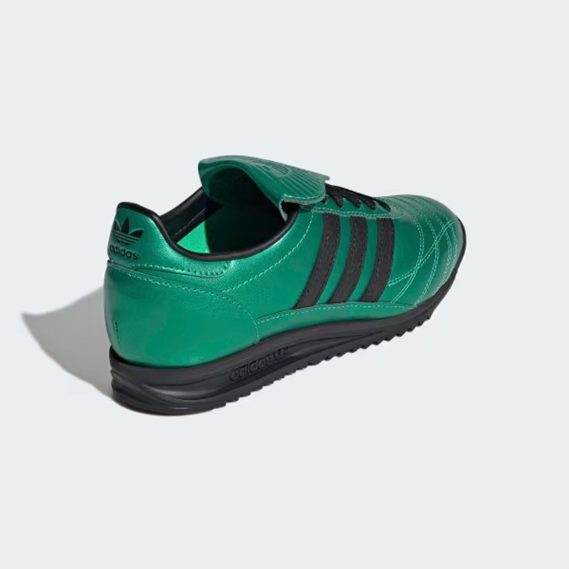 Adidas SL 72 OG Womens Retro Sneakers in action, showing off their stylish design and comfortable fit.