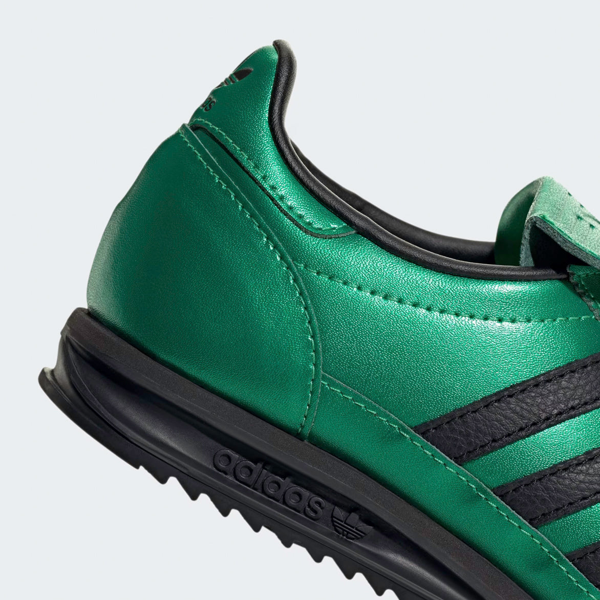 Adidas SL 72 OG Womens Retro Sneakers in action, showing off their stylish design and comfortable fit.