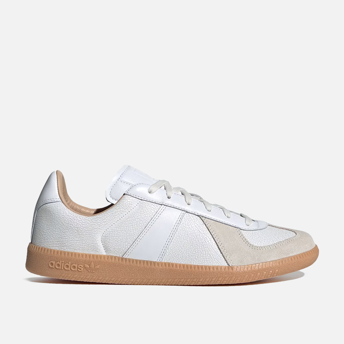 Side view of Cloud White luxury sneakers featuring a gum sole, ideal for everyday wear.
