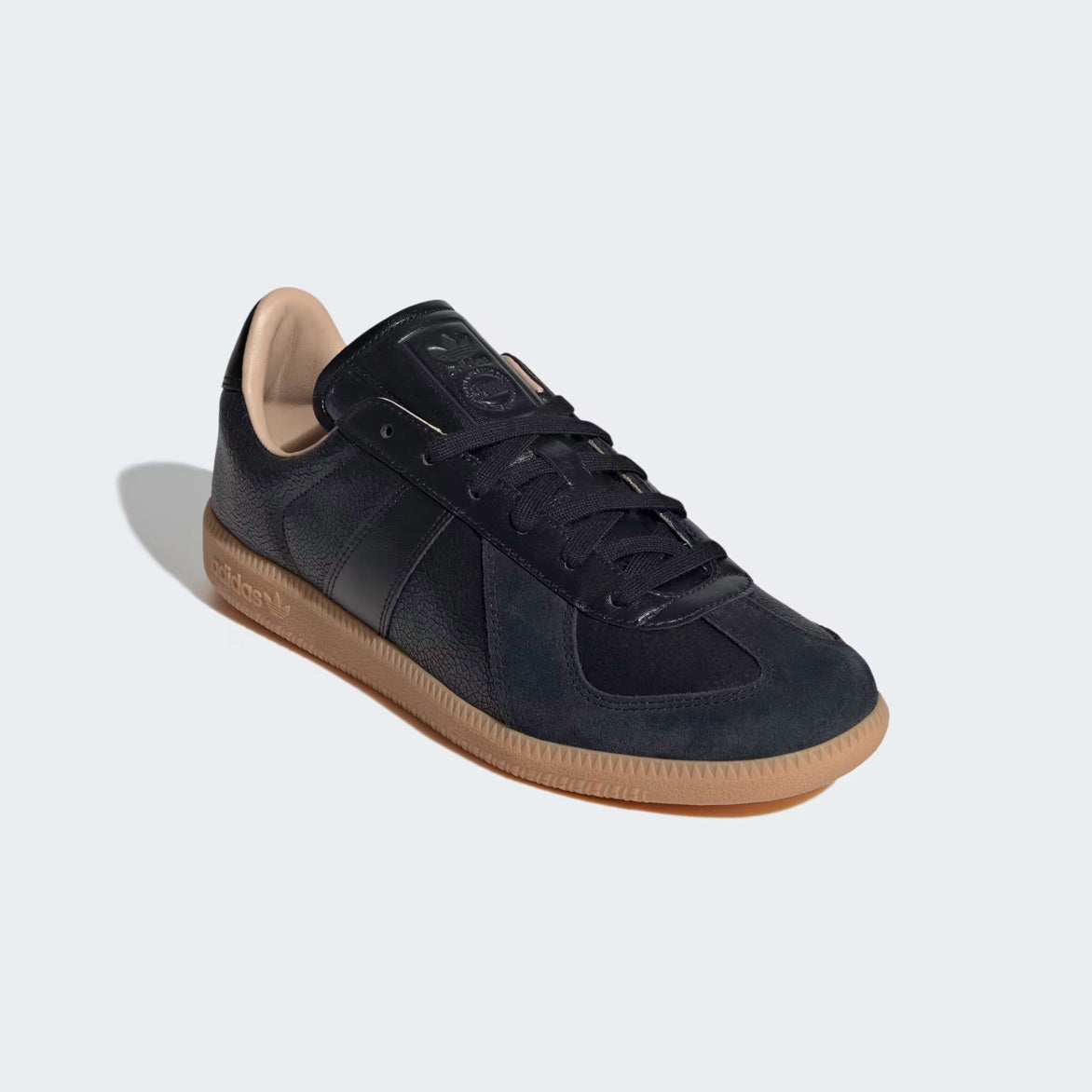 Top-down view of the Adidas BW Army Lux showcasing the sleek design and embossed branding on the tongue.