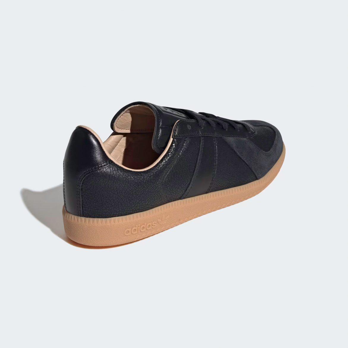 Close-up of the gum rubber cupsole of the Adidas BW Army Lux, emphasizing comfort and durability.
