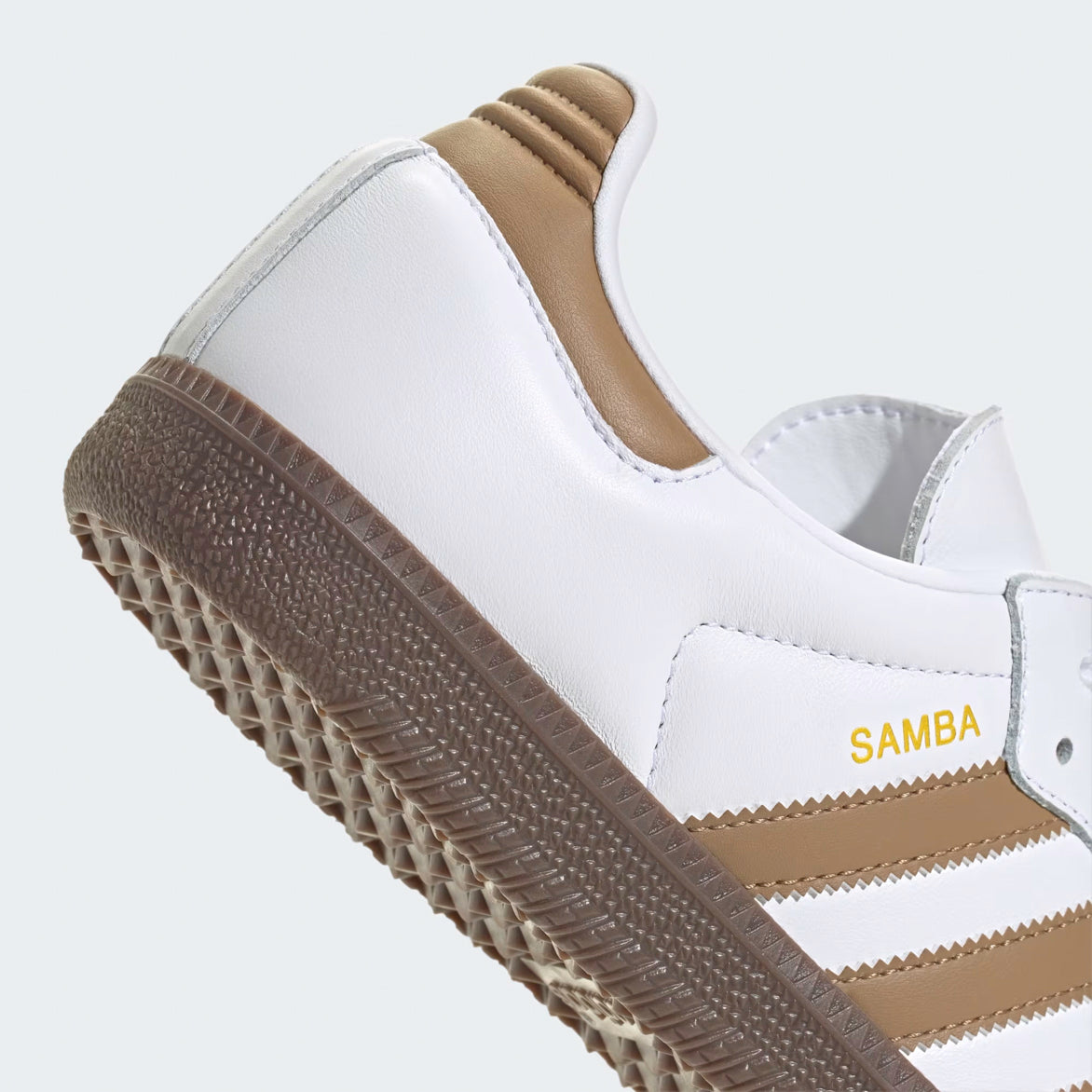 Close-up of the gum rubber outsole and leather details on Adidas Samba OG shoes