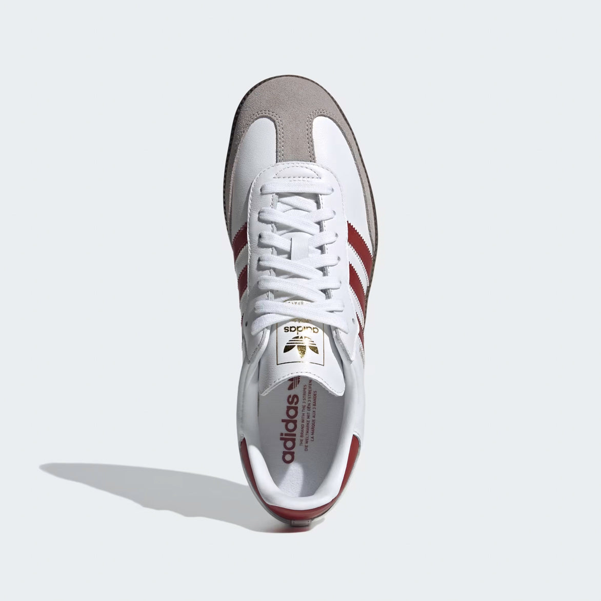 Side view of limited edition Samba OG shoes showing branding details