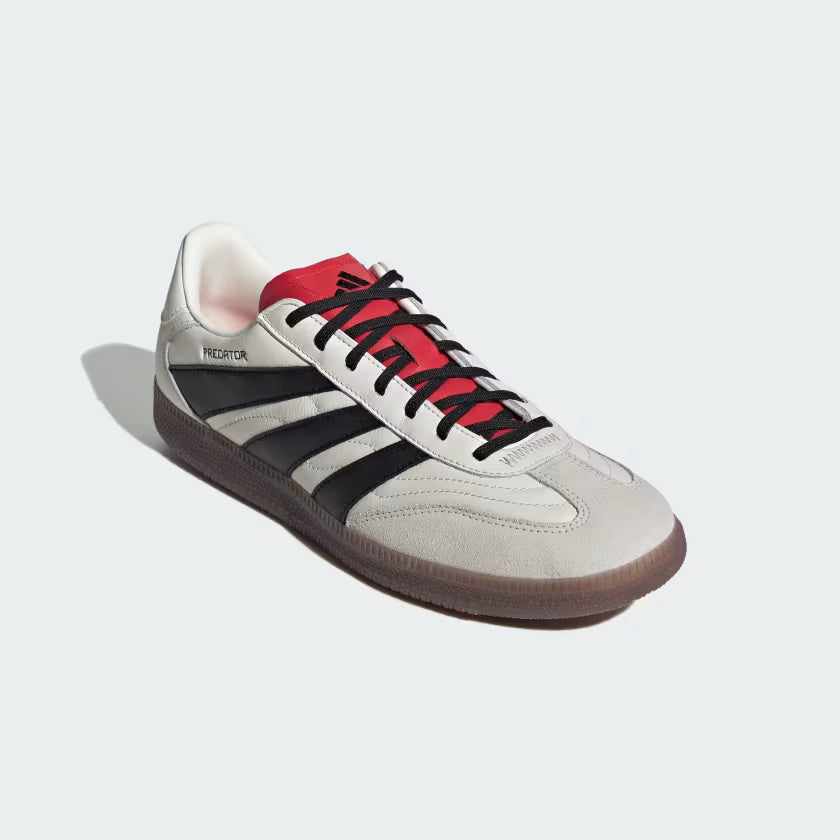Top-down shot of Adidas Predator Freestyle shoes highlighting breathable mesh and cushioned insole