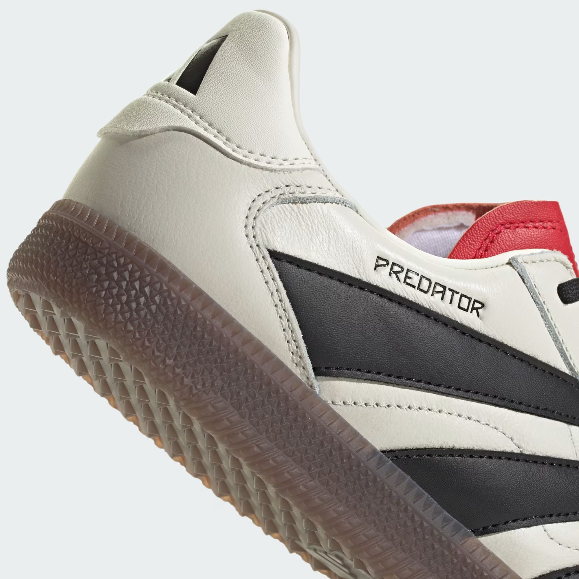 Top-down shot of Adidas Predator Freestyle shoes highlighting breathable mesh and cushioned insole