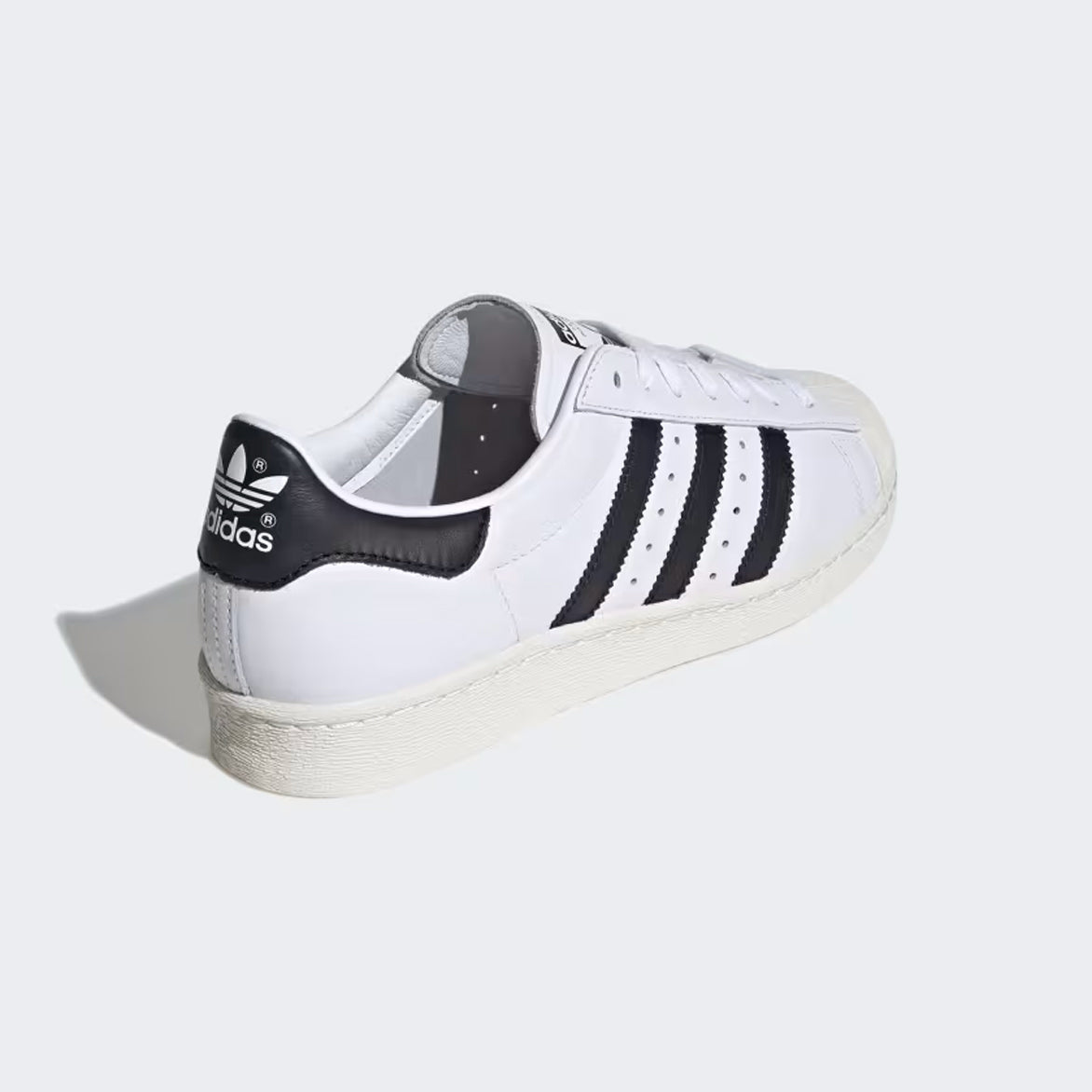 Lifestyle image of Adidas Superstar 82 worn with casual outfits, perfect for everyday wear.