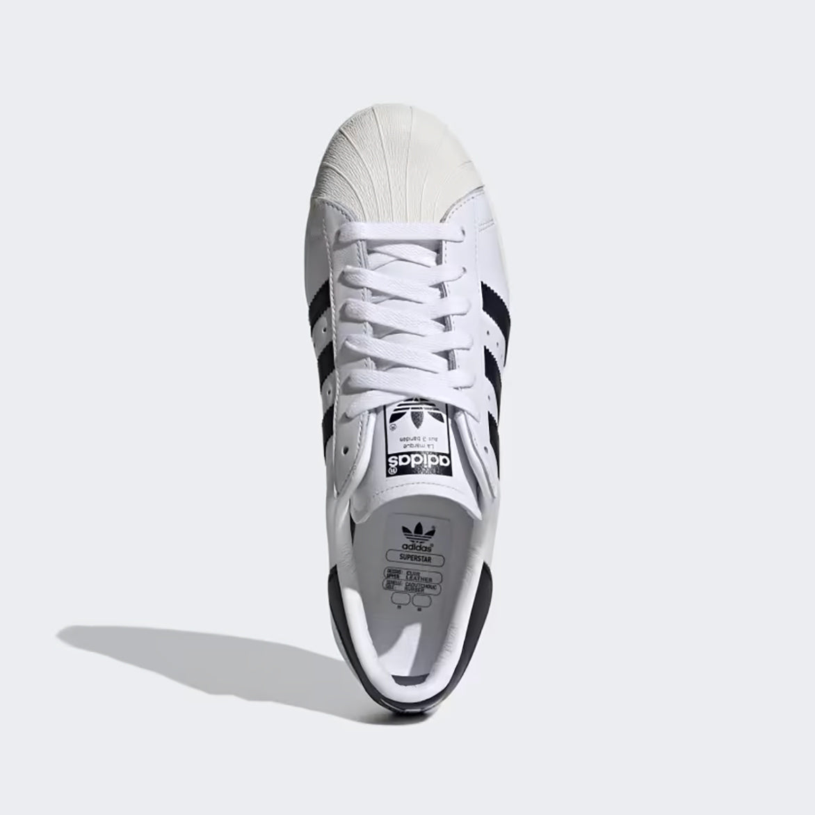 Lifestyle image of Adidas Superstar 82 worn with casual outfits, perfect for everyday wear.