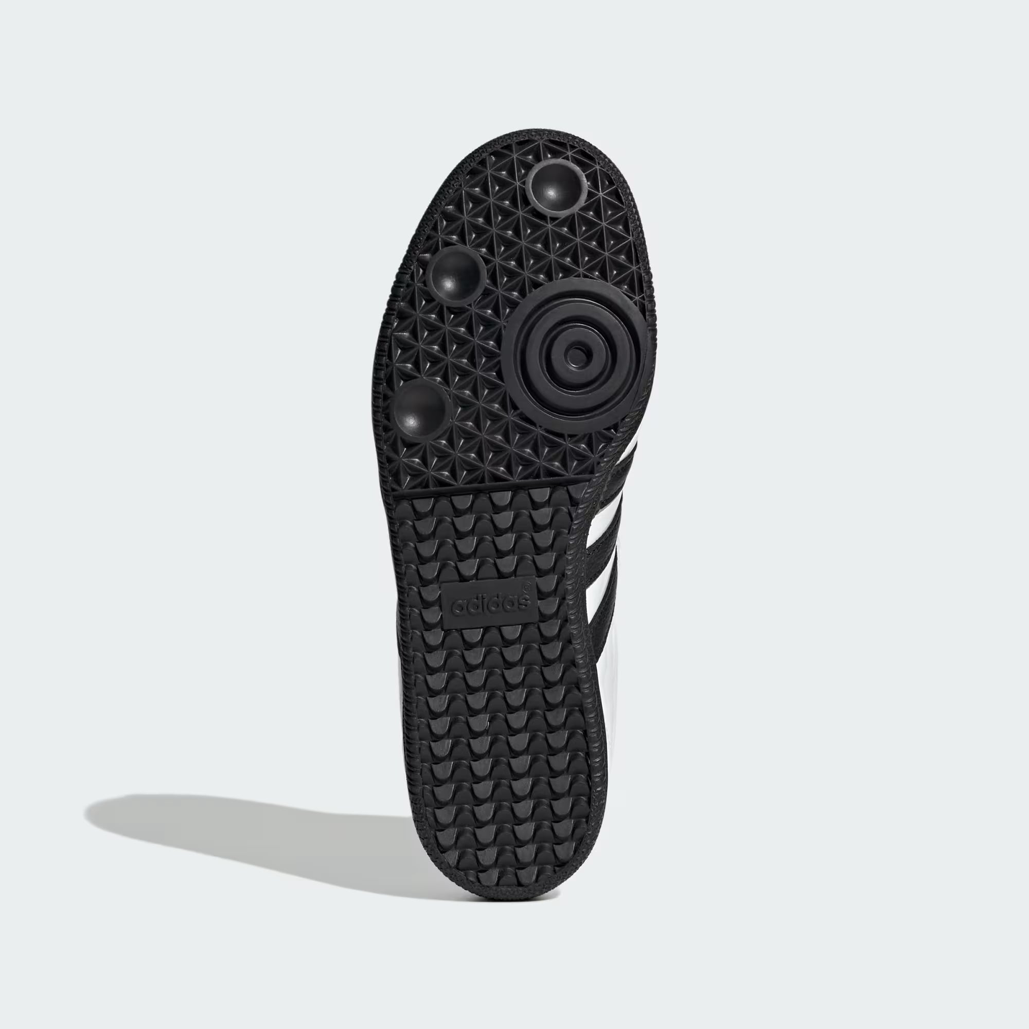 Side view of women’s limited edition Samba sneakers highlighting the leather detailing