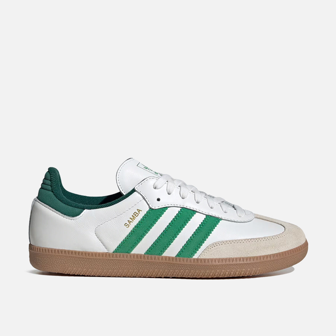 Side view of Adidas Samba OG white and green sneakers highlighting the leather upper and green accents Side view of Adidas Samba OG white and green sneakers highlighting the leather upper and green accents