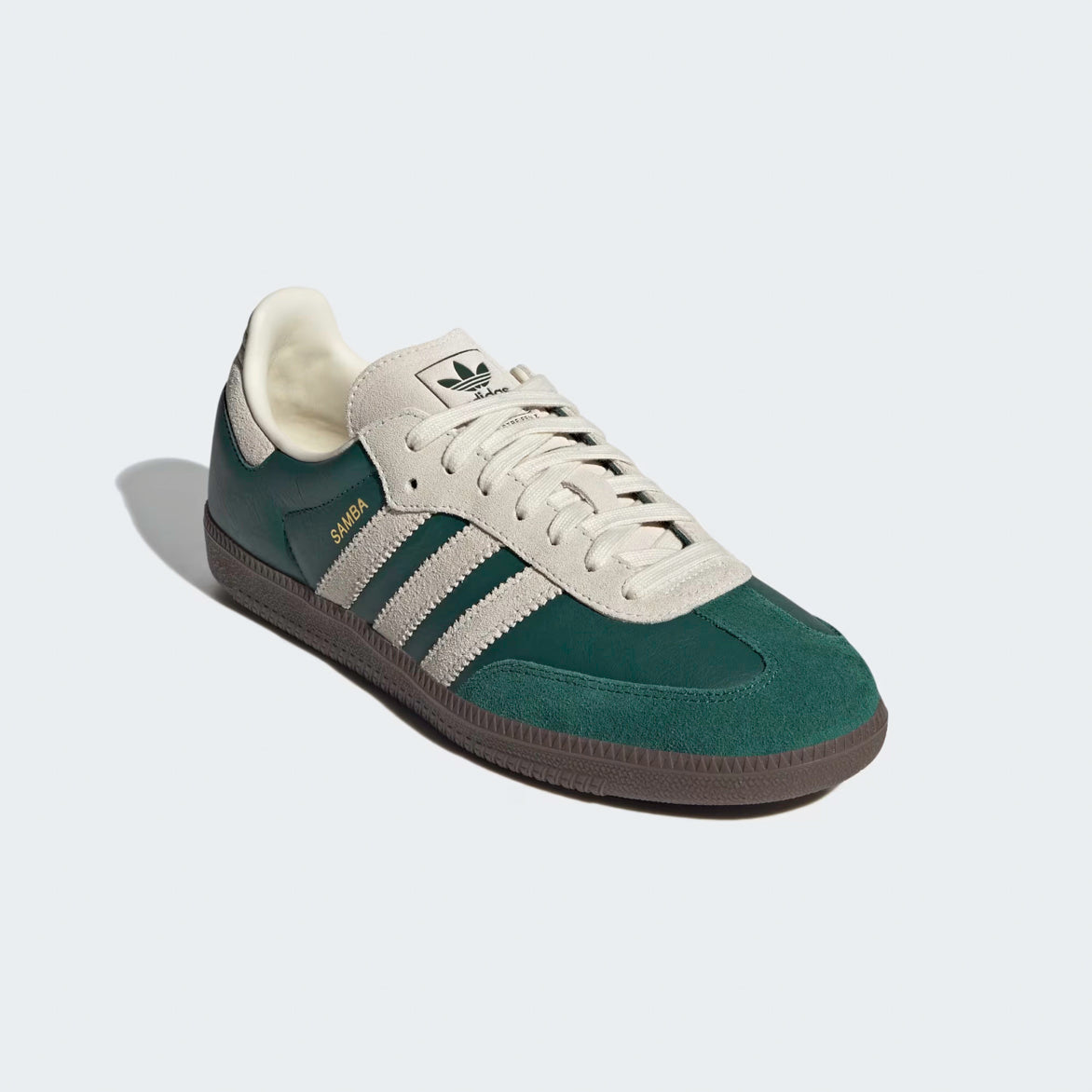 Side view of Adidas Samba OG Sneakers, showing the iconic 3-Stripes and gold Samba branding.
